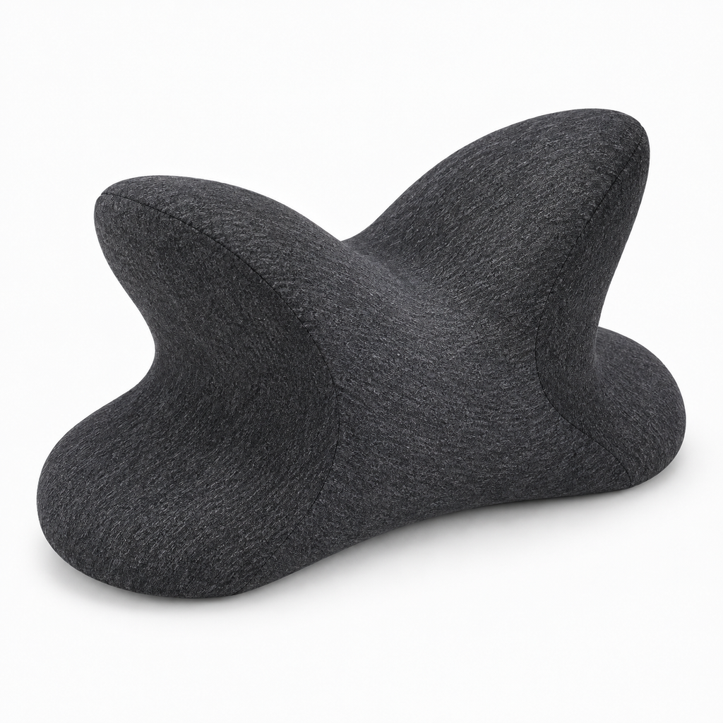 Black memory foam nap pillow side view showing raised wings and central cradle