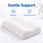 White cervical pillow on bed with gentle support, stable fill and breathable contact icons