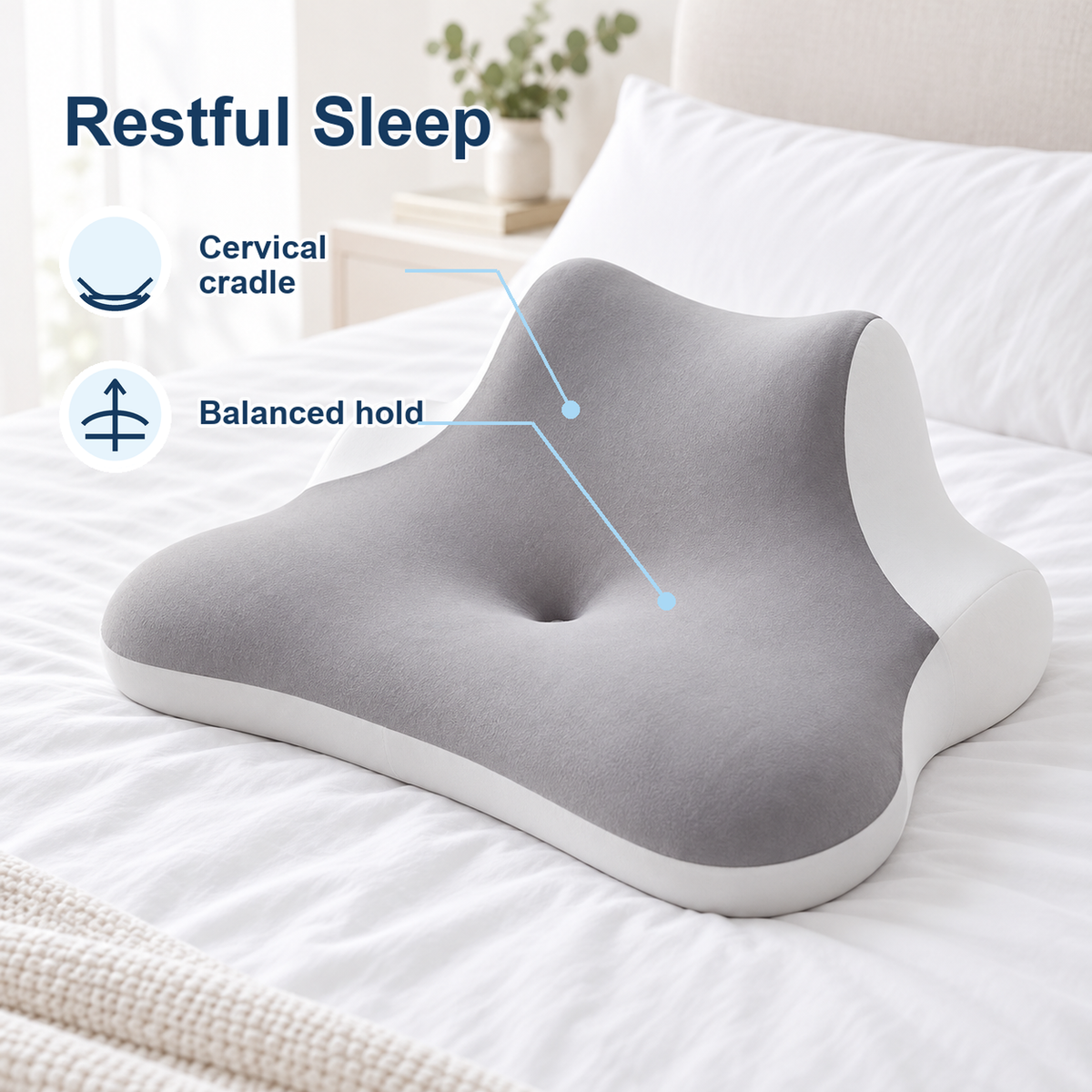 Grey cervical pillow on bed with restful sleep, cervical cradle and balanced hold icons